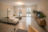 EG_Wohnzimmer_KI gestaged - Gepflegtes Familienhaus Raunheim: Wintergarten, Südterasse, Keller & Buderus 2022