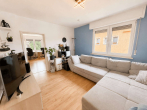 OG_Wohnzimmer 2 - Freistehendes ZFH – bezugsfertiges OG + 43 m² Nutzfläche im DG, Garten + 2 Garagen