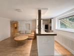 KG_Wohnraum mit Theke_2 - Großzügige und moderne Hochparterre-Wohnung +58 m² Hobbykeller, Doppelgarage und großem Garten