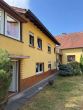 Außen_Fassade_Hinterhaus - Zwei Gebäude auf grünem Grundstück: Doppelhaushälfte mit Hinterhaus in Hattersheim-Okriftel