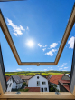 Wohnzimmer_Blick in die Weinbe - 4-Zimmer-Dachgeschoss mit Süd-Terrasse & Kamin in Dienheim – bezugsfrei ab 01.08.2026