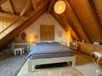 Schlafzimmer - 4-Zimmer-Dachgeschoss mit Süd-Terrasse & Kamin in Dienheim – bezugsfrei ab 01.08.2026