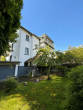 Innengarten_Rückwand des Haus - Dreifamilienhaus mit großem Garten: Modernisiertes EG sofort frei, OG + DG vermietet, +Ausbaureserve